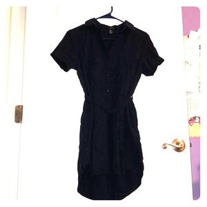 Navy blue short sleeved button down romper.